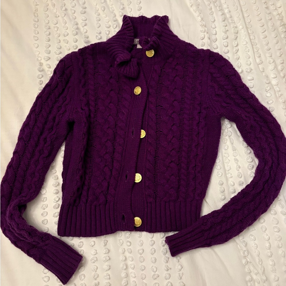 Cable knit ruffleneck cardigan sweater